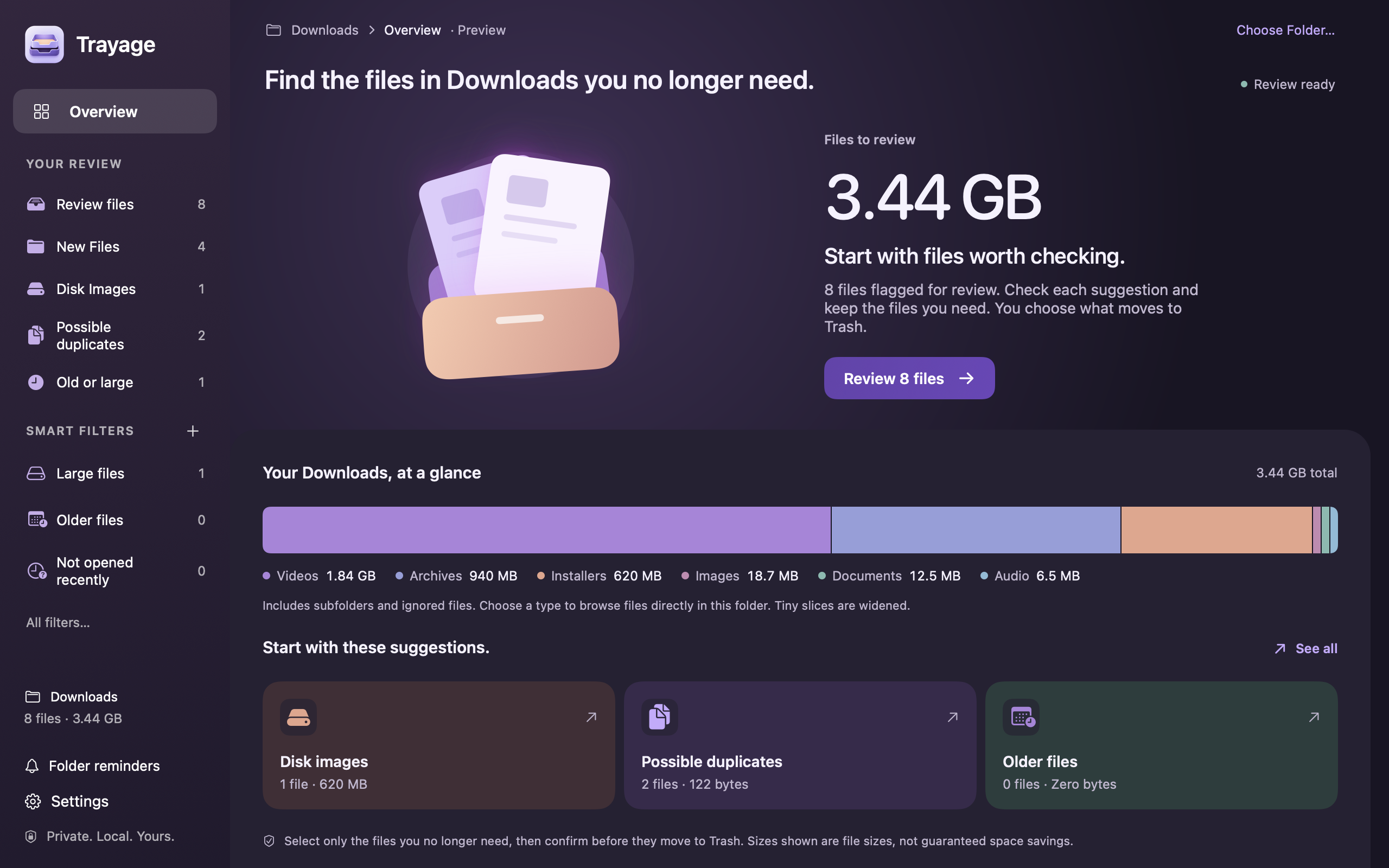 Trayage 1.1 in dark appearance, showing a Downloads overview with sample files.