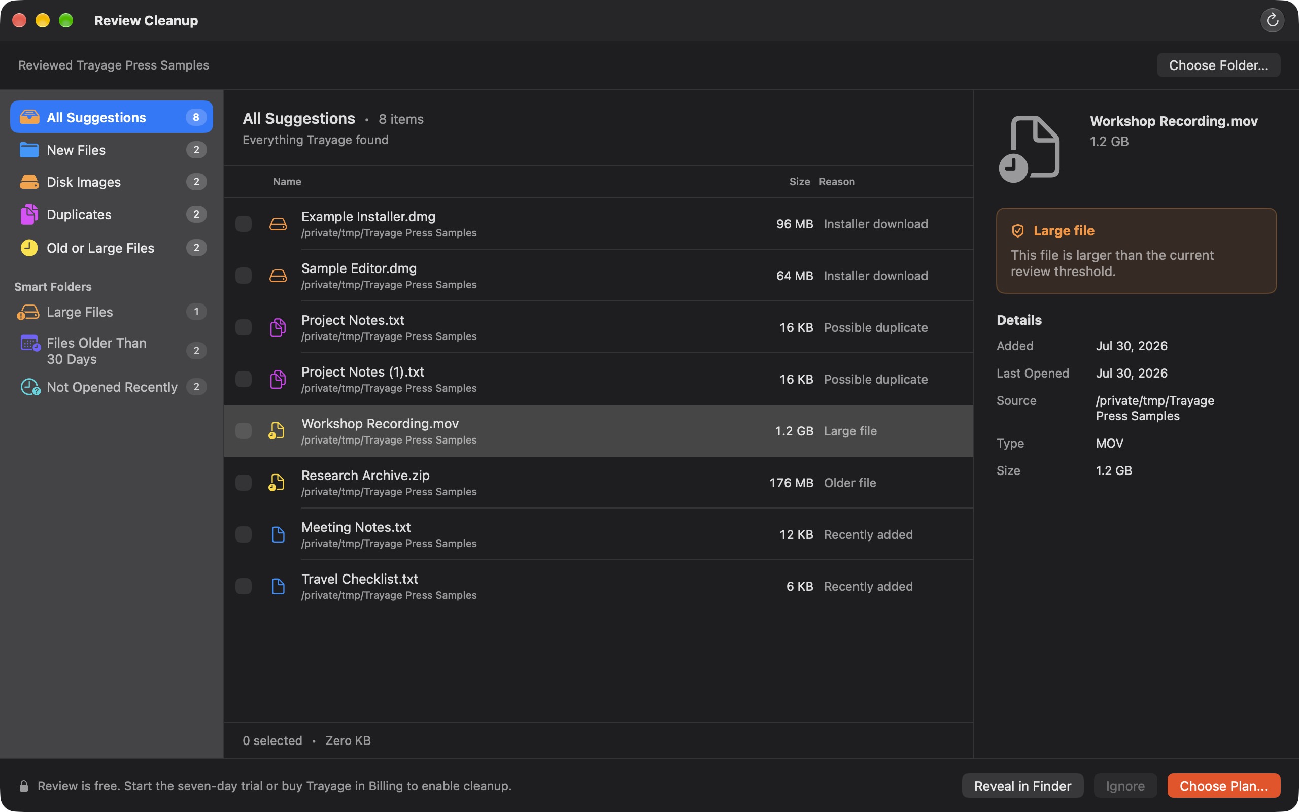 The actual Trayage review window showing file categories, a list of sample downloads, and details for a selected large file.